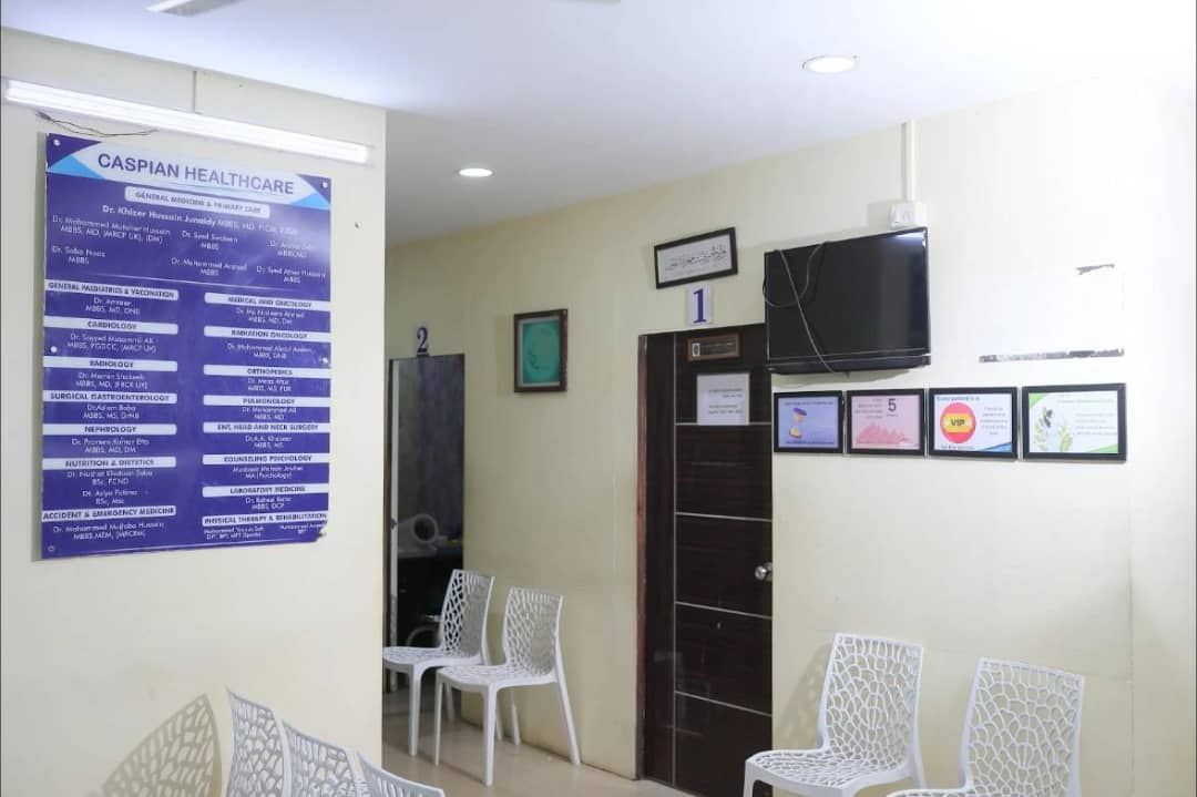 The waiting area at Caspian Healthcare, Vijay Nagar Colony, with the consulting room doors