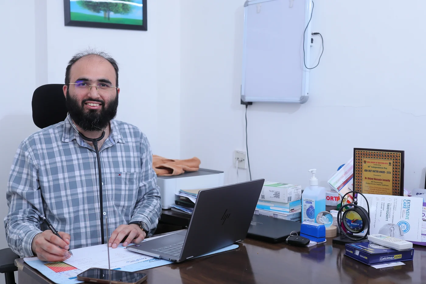 Dr Khizer Hussain Junaidy at his desk in the outpatient room at Caspian Healthcare, Vijay Nagar Colony, Hyderabad